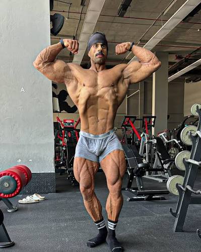 Abu Rabiea posing in the gym